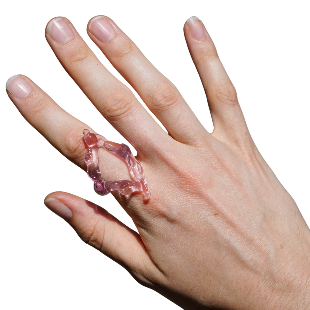 Rombo Sculptural Glass Ring 0111 in baby pink hand-sculpted borosilicate glass, worn on the hand, Rain and Rivers