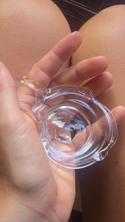Ashtray 0001, individual ashtray in clear hand-sculpted borosilicate glass, held in the hand, Rain and Rivers, Barcelona