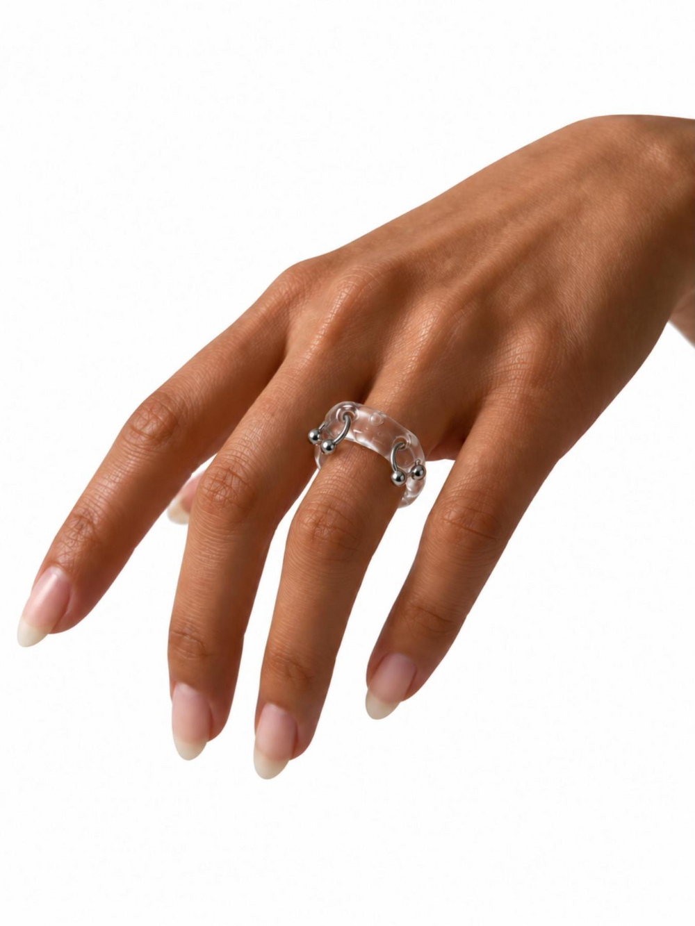 Double Pierced Glass Ring 0021 by Rain and Rivers: a handmade clear glass band with a flat organic top pierced by two stainless steel horseshoe piercings, worn on the hand, on a white background