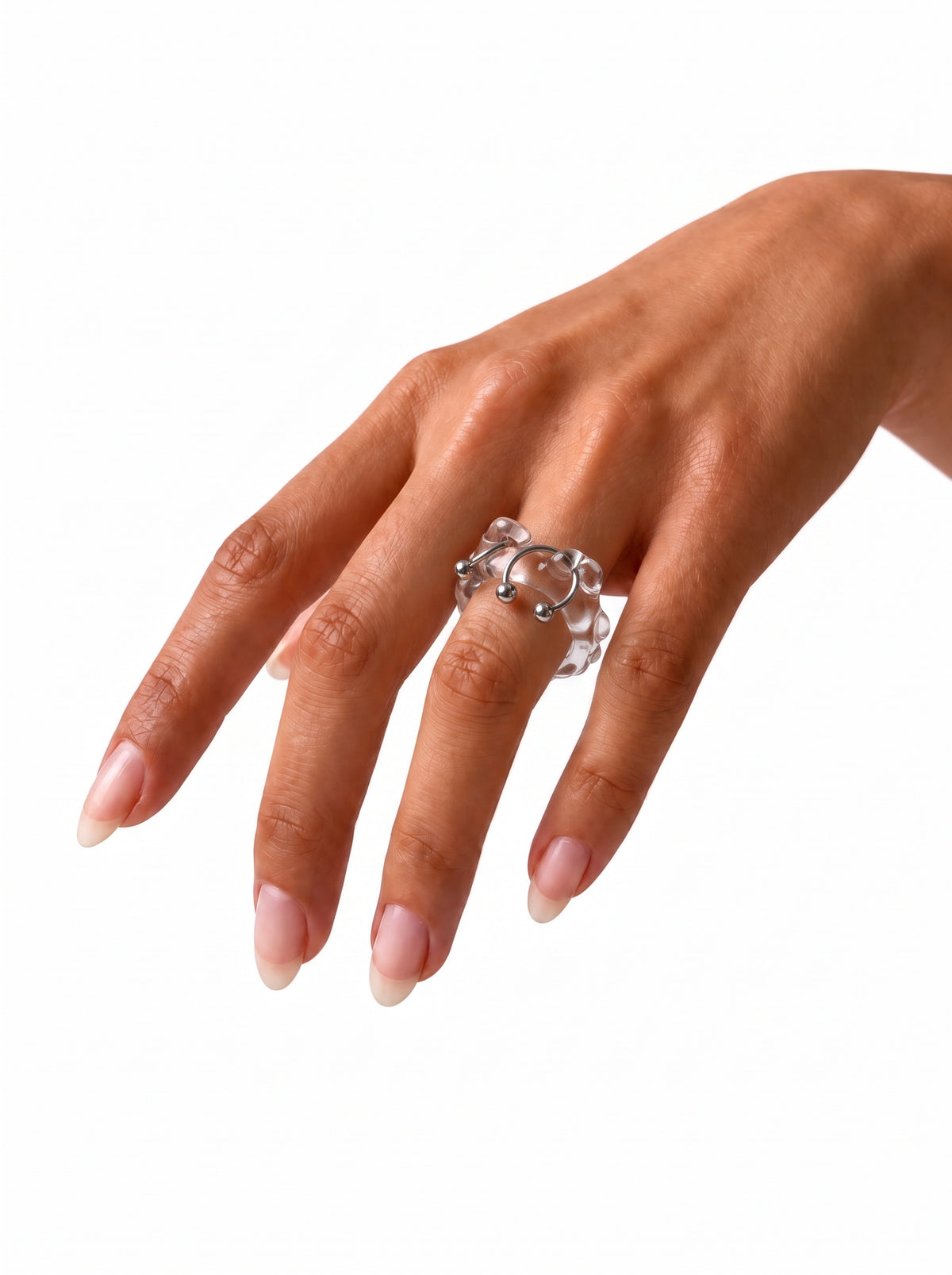 Organic Pierced Glass Ring 0062 in clear hand-sculpted borosilicate glass with stainless steel horseshoe piercings, worn on the hand, Rain and Rivers