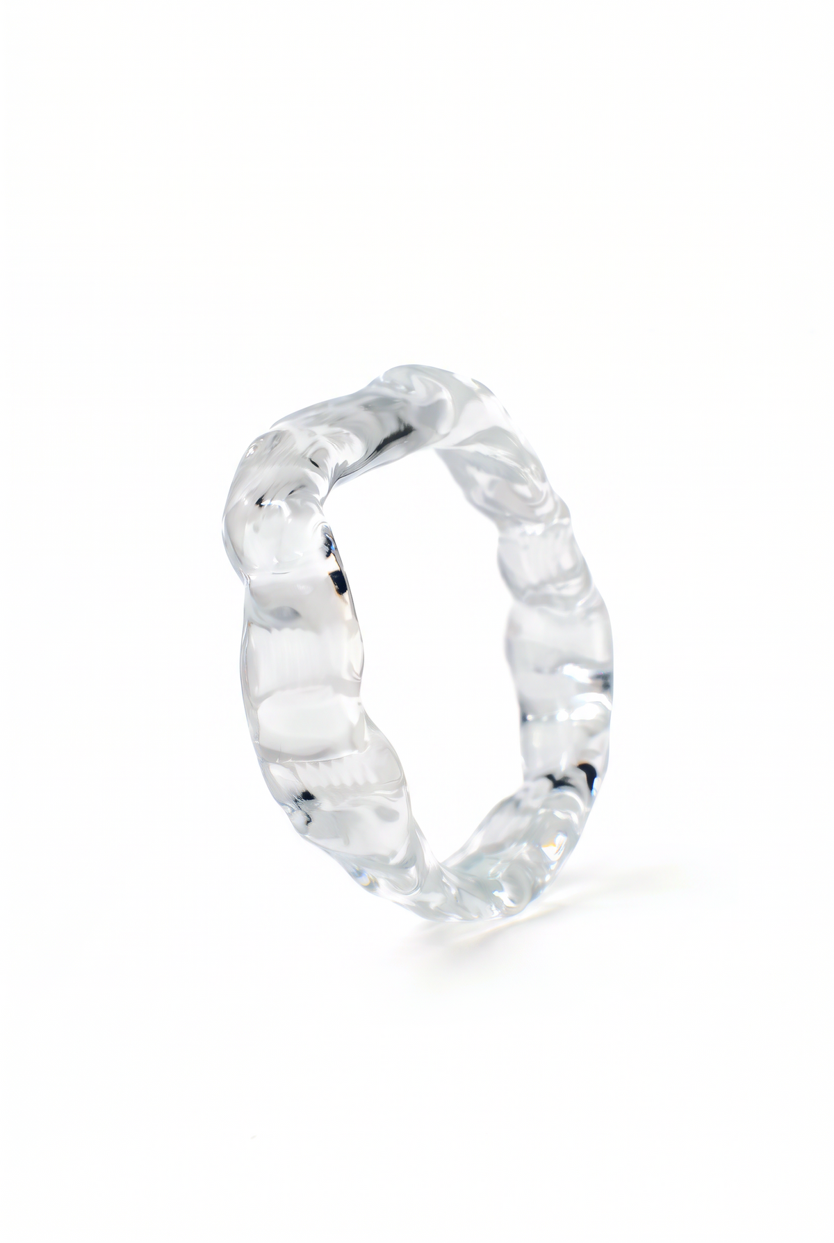 Rain and Rivers Textured Stacking Glass Rings 0124 – hand-sculpted ribbed clear borosilicate glass stacking ring, handmade in Barcelona, product photo on white